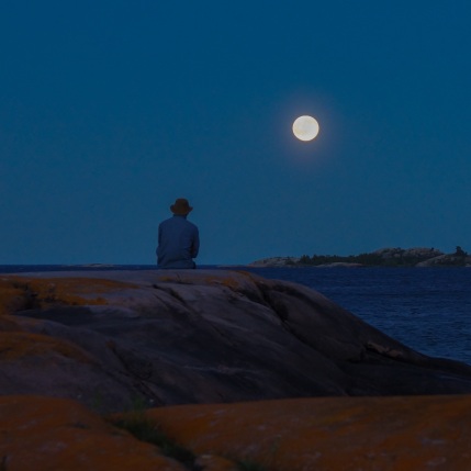 Max contemplating the moon to the east of Martin's island